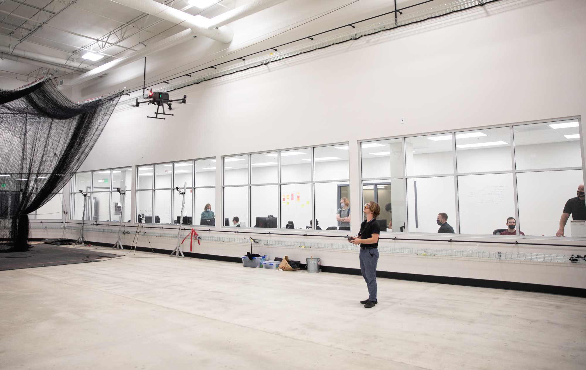 Student at the Westside Research Park in a drone testing studio.